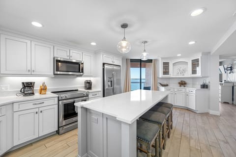 Gourmet kitchen with island and seating