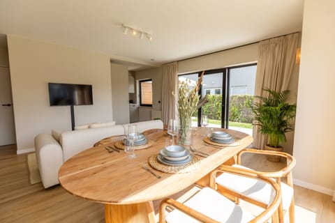Bright living room with large windows. ✨