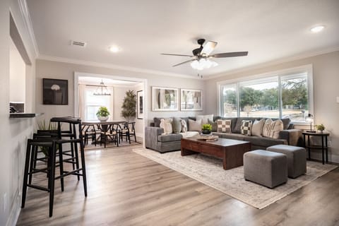 ozy living space with large smart TV and comfortable seating for the whole group.