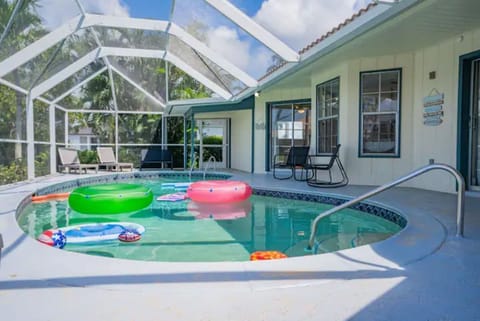 Vibrant pool, filled with an array of colorful pool toys and floats