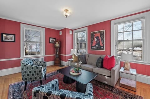Spacious living room with historic touches and plenty of seating
