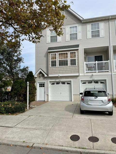 Front of the townhouse. End unit next to a park!  Private 2 car garage.
