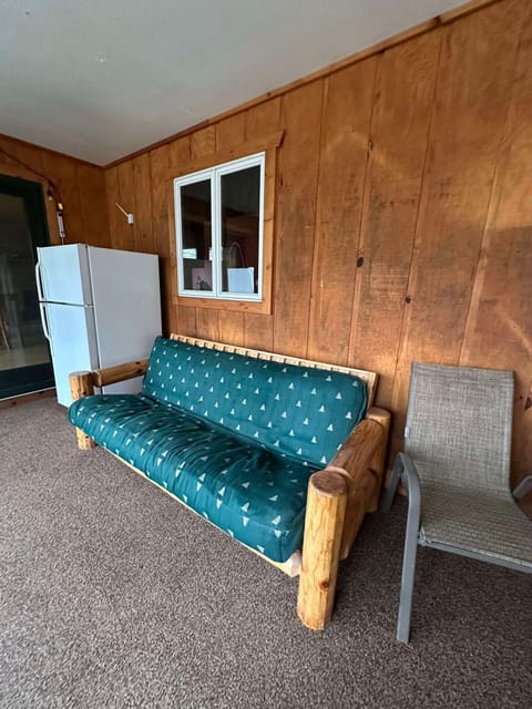 Porch enter by the refrigerator  through the glass door.