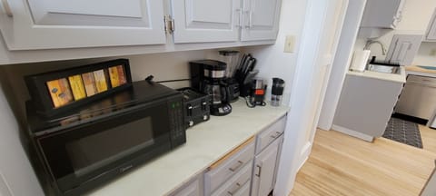 Fully stocked with microwave, coffee maker, toaster, blender, pots, pans, etc.