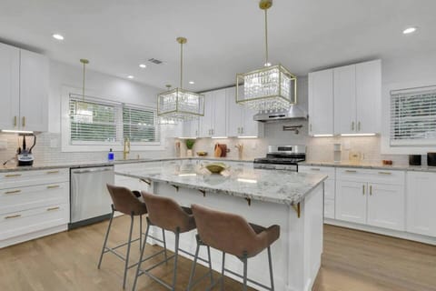 Feel right at home in this spacious, stylish kitchen—perfect for preparing meals!