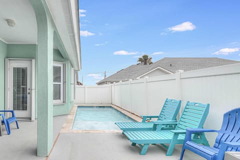 Your private pool oasis awaits with comfortable loungers and covered patio space for ultimate relaxation.
