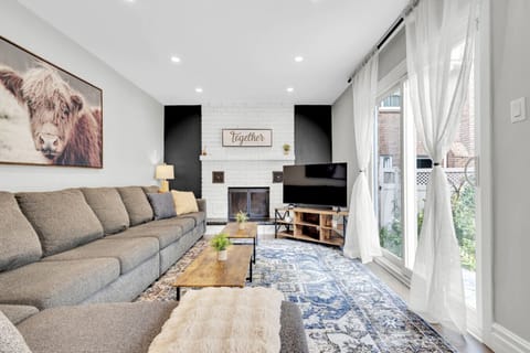 Spacious living room with modern design and ample seating