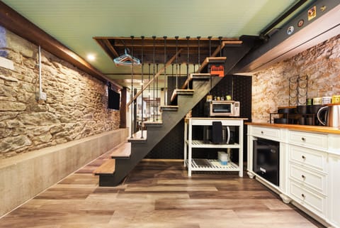 Compact kitchen with everything needed for a simple meal.