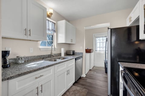 Seating for 6+ enjoy your meals at the large dining table and chairs offered in this perfectly equipped home with high speed wi-fi, pots and pans, cookware, utensils, laundry, extra bedding, cleaning products, new appliances and more.