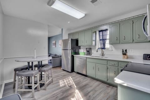 Offering table top space for up to six between our two tables and comfy chairs. We cater to groups of all sizes with this perfectly equipped home. Fully stocked kitchen with amenities including cookware, coffee utensils and plenty of natural light. 