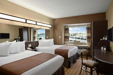 Recharge in two comfy beds with plenty of space around.