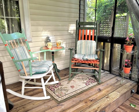 Cozy screened porch for sipping coffee and relaxing