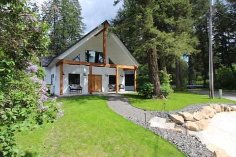 Cozy farm style home in the woods. Covered front porch with views of the lake!