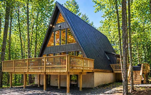 Iconic A-Frame Exterior Surrounded by Pines