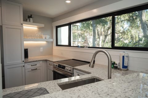 Fully equipped kitchen with stainless steel appliances