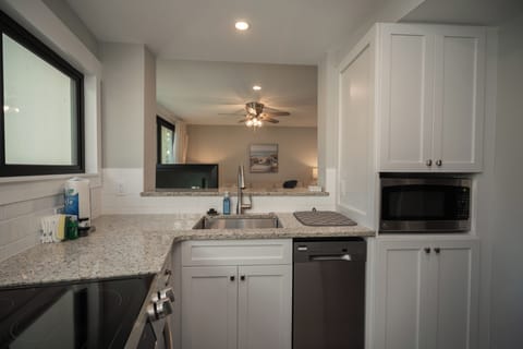 Fully equipped kitchen with stainless steel appliances