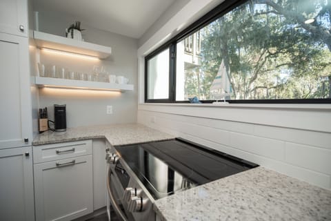 Fully equipped kitchen with stainless steel appliances
