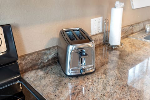 Spanning across the room, the countertops provide ample surface area, perfect for everything from assembling a quick breakfast to crafting an elaborate gourmet dinner.