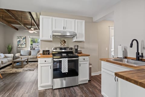 Modern, easy-to-clean appliances for full meal preparation.