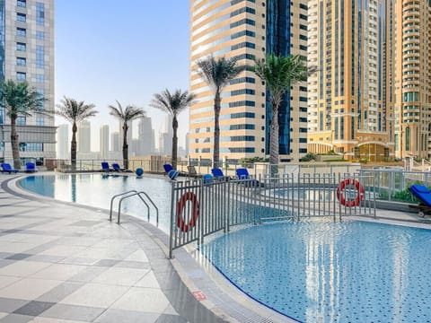Pool Paradise: Dive into luxury at our stunning rooftop pool with city views!