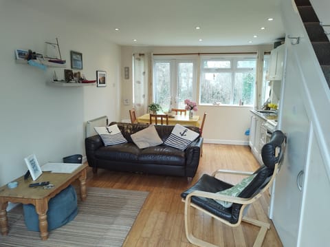 Lounge with dining area behind