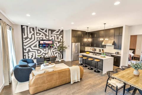 Discover Nashville in this stylish home! With a modern kitchen and cozy living area, it's perfect for your getaway. Book your stay with Misfit Homes for luxury in Music City!