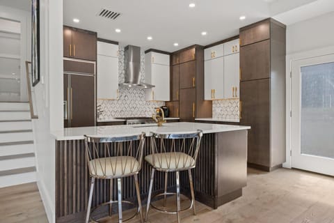 Wonderful kitchen with stainless appliances and counter seating