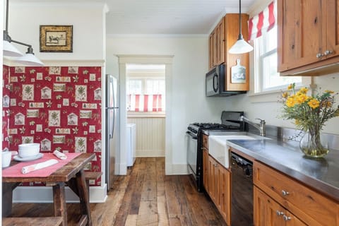 Kitchen is stocked with everything needed to cook meals.