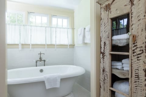 Large soaking tub and full shower in bathroom #1