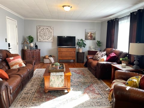 Make yourself at home! The private entrance to Apt C opens into the living room.