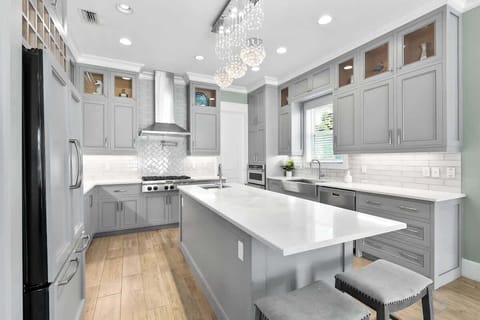 Clean Lines & Gourmet Vibes are Found Here in this Beautiful Kitchen