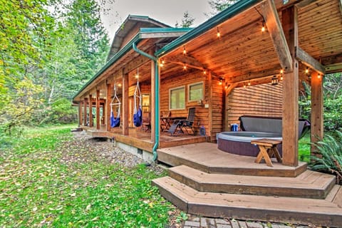 Photo taken from the campfire area facing the wraparound deck and hot tub
