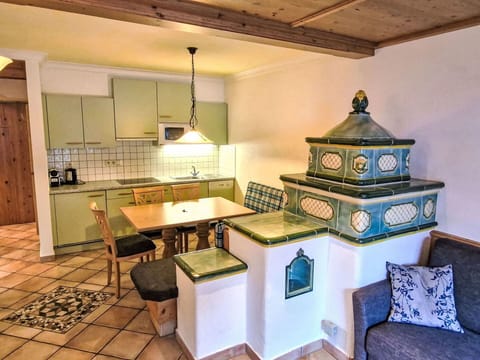 Interior Design, Flooring, Ceiling, Floor, Furniture, Room, Living Room, Light Fixture, Couch, Cabinetry