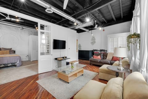 Smartly designed common space with a comfy couch, smart TV, and nice natural light.  All you have to do is log into your favorite streaming services and make it a TV night.
