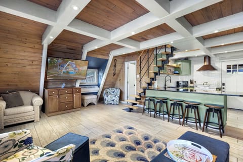 Living area with stunning lake view, queen sofa sleep, and Smart TV