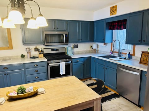 Large kitchen with seating for 8. Add’l seating for 2 more at adjacent high top.