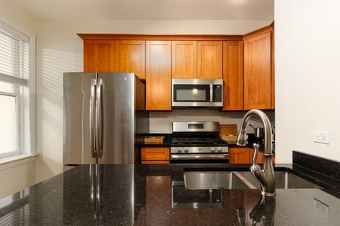 Full kitchen with bar stool seating