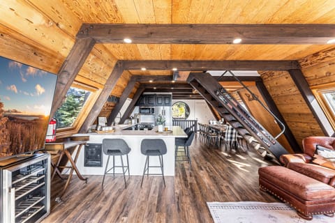 A chef's delight! The gourmet kitchen features sleek countertops, state-of-the-art appliances, perfect for meal prep or casual dining. Seating for 4 around the kitchen. A drip coffee maker is provided.