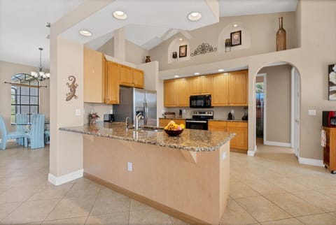 Bright, open kitchen overlooking living room
