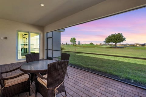 Lanai overlooking golf course and pond. Lanai faces west