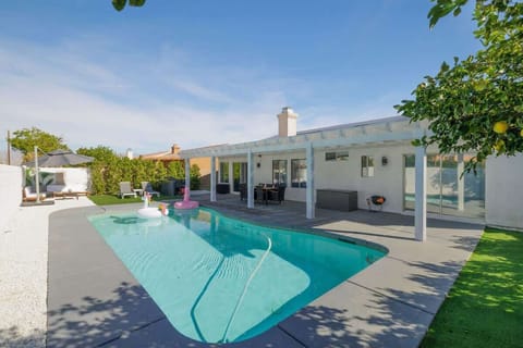 Cool off and relax by your private pool under the desert sun