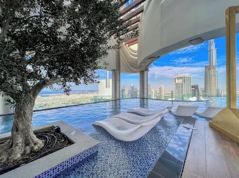 Infinity roof top swimming pool with Burj khalifa view.