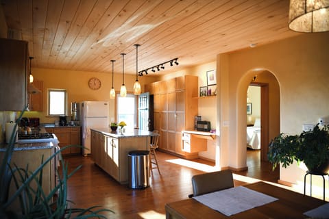 Kitchen with classic island, access to bedrooms