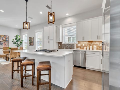 Prepare delicious meals and enjoy quality time with family in our spacious, well-equipped kitchen, featuring modern appliances and everything you need for a seamless cooking experience. We have a Keurig and drip coffee maker available.