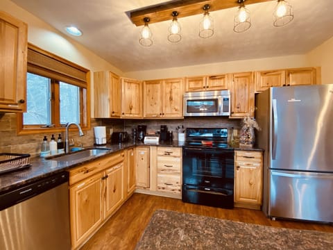 Large Kitchen with Plenty of Workspace on 2nd Floor. and a Breakfast Nook to keep the Chef Company!