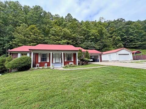 Front w/ driveway garage & carport