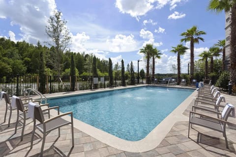 Dive into sunshine and unwind beside the sparkling resort pool.