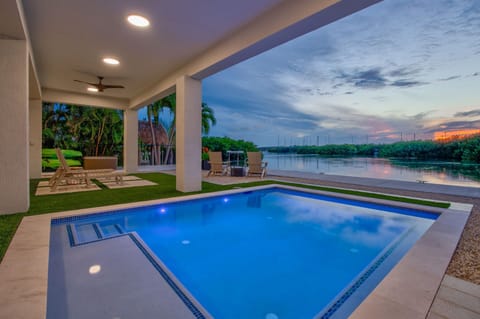 Sunset view of the pool and canal