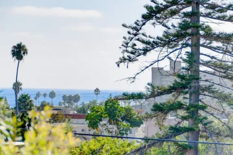 Partial ocean views greet you from this peaceful coastal retreat—enjoy beautiful sunsets and refreshing sea breezes just minutes from the beach.