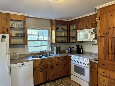 Stocked kitchen well supplied with all you need at your fingertips. 